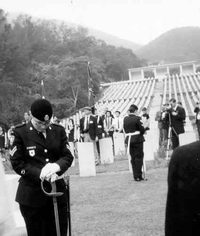 Cadets from the Winnipeg Grenadiers & RCR accompanied the vets on a pilgrimage. Here they stand guard in Sai Wan Cemetery, Hong Kong