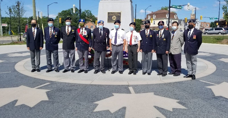 Members of the Royal Hong Kong Regiment (The Volunteers) assembled 
		for a ceremony at Veterans Square in Markham, ON