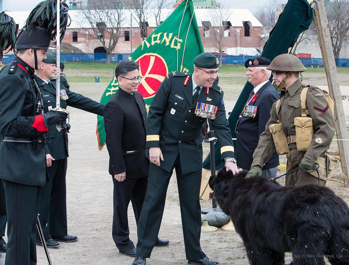 During the inspection, Honorary president of the celebrations, of the Canadian Forces Brig. Gen. Stephane Lafaut, OMM, CSM. CD greets “Gander” of the day.