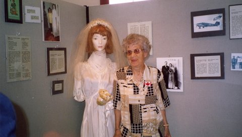 Lyla Stimson Beatty with the wedding gown made out of 
		parachute silk