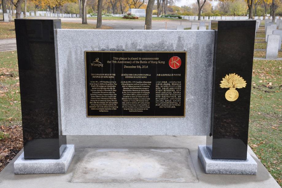 Looking East 75th Anniversary plaque with Grenadiers grenade on the pillar 