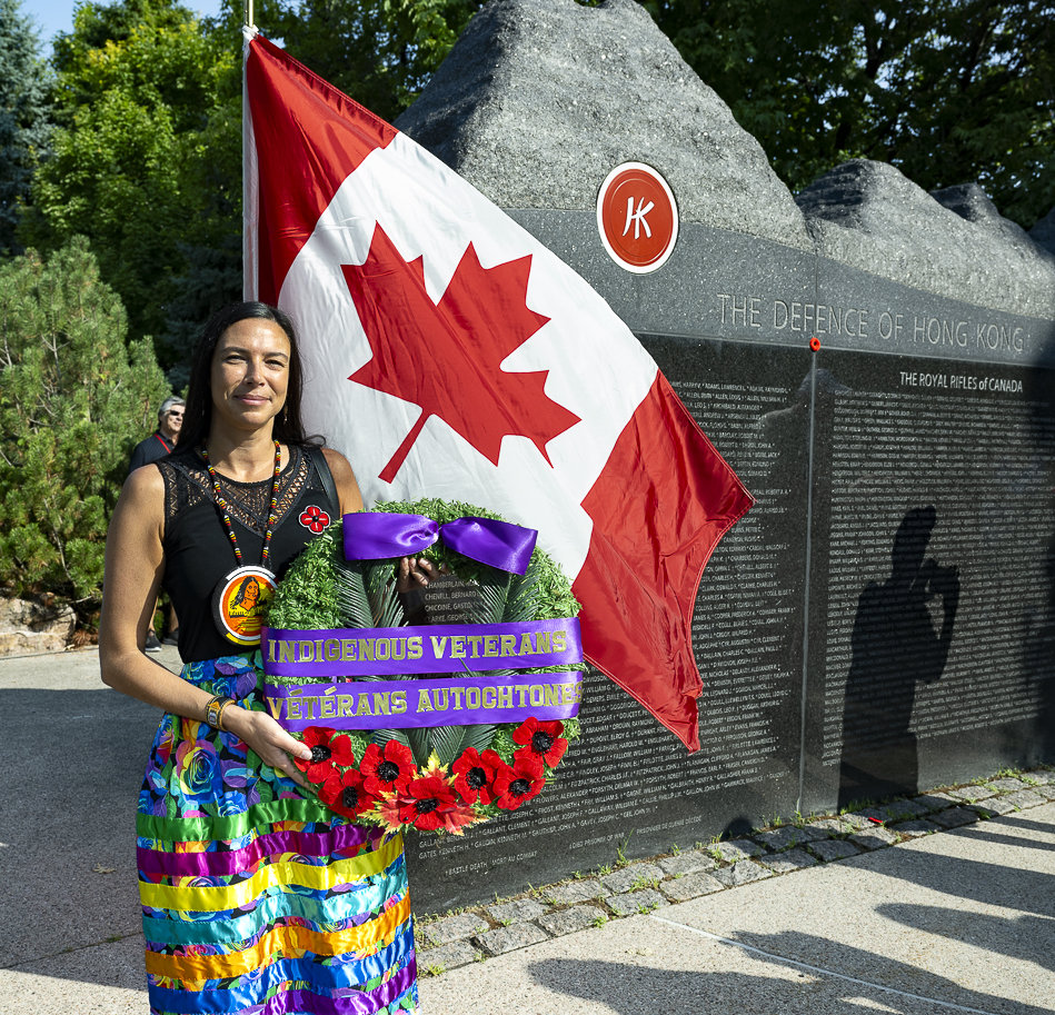 Julie Carver,&nbsp; great niece of Private Robert 
					Blanchard of the Winnipeg Grenadiers, at the Memorial Wall 
					(Richard Lawrence photo)