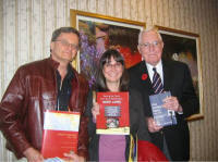 Nick Brune, Nancy Hamer Strahl & George MacDonell, each with the book they authored. Click for larger image