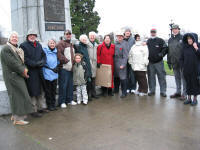 Gerry and Ev Gerrard with the group at the Cenotaph. Click for larger image