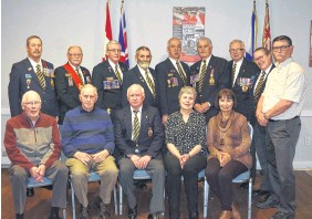 Members of Royal Canadian Legion Branch 26 and relatives of soldiers who fought the Japanese in Hong Kong gathered recently to unveil a commemorative plaque of the 1941 battle