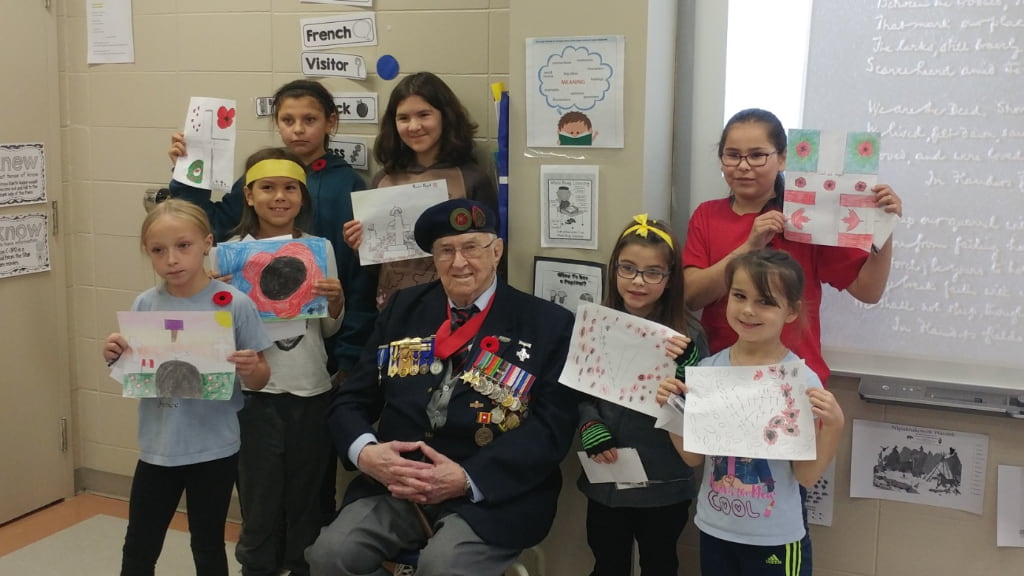 Philip Doddridge with New Richmond Royal Canadian Legion Remembrance poster winners
