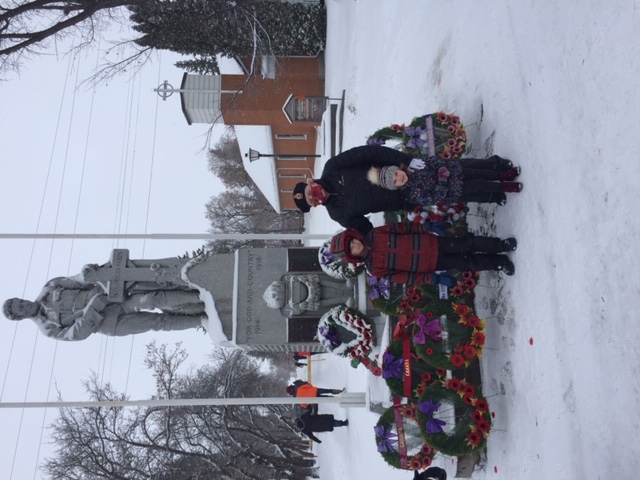 Judy Preston and Grandchildren at the Cenotaph in Russell